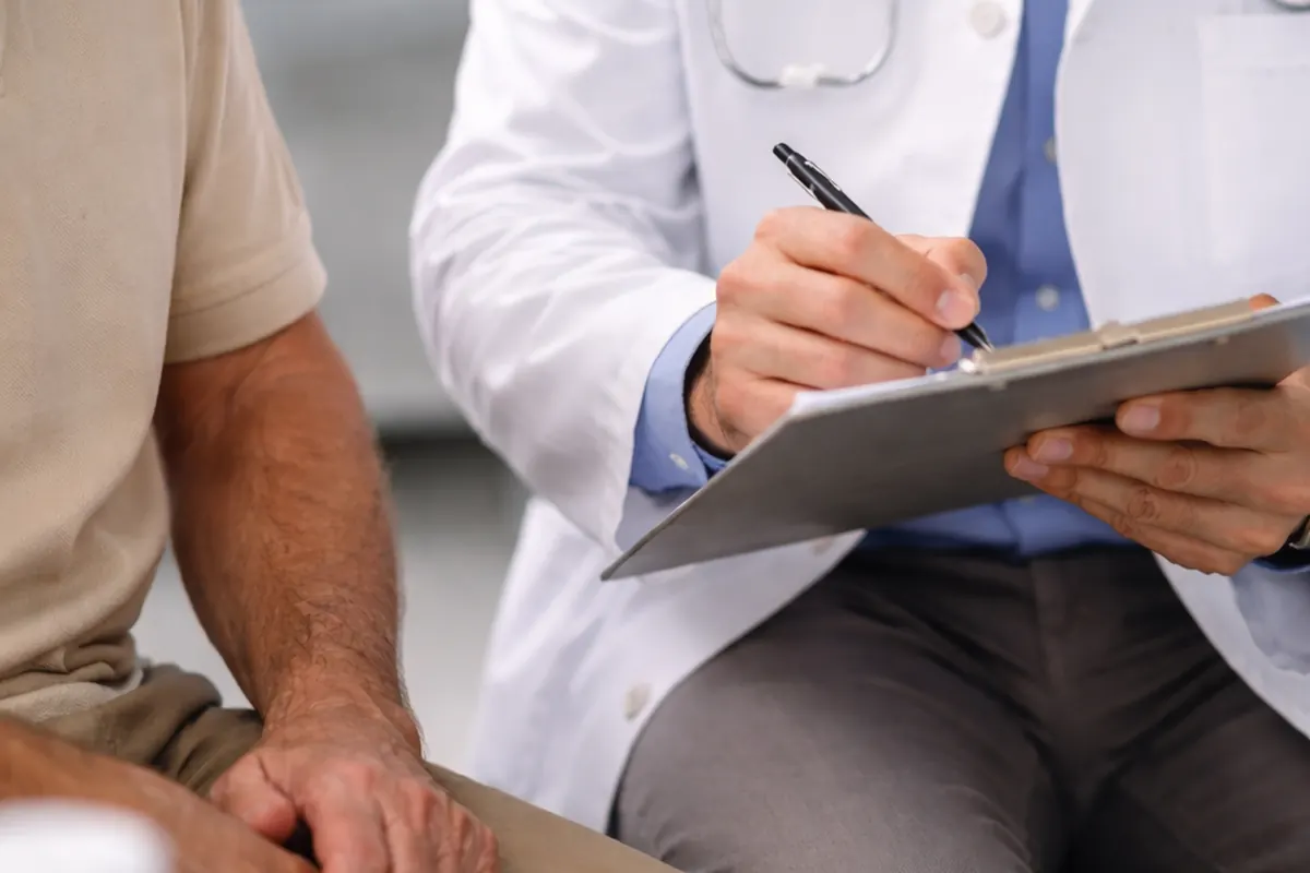 Physician explaining medical costs to a patient